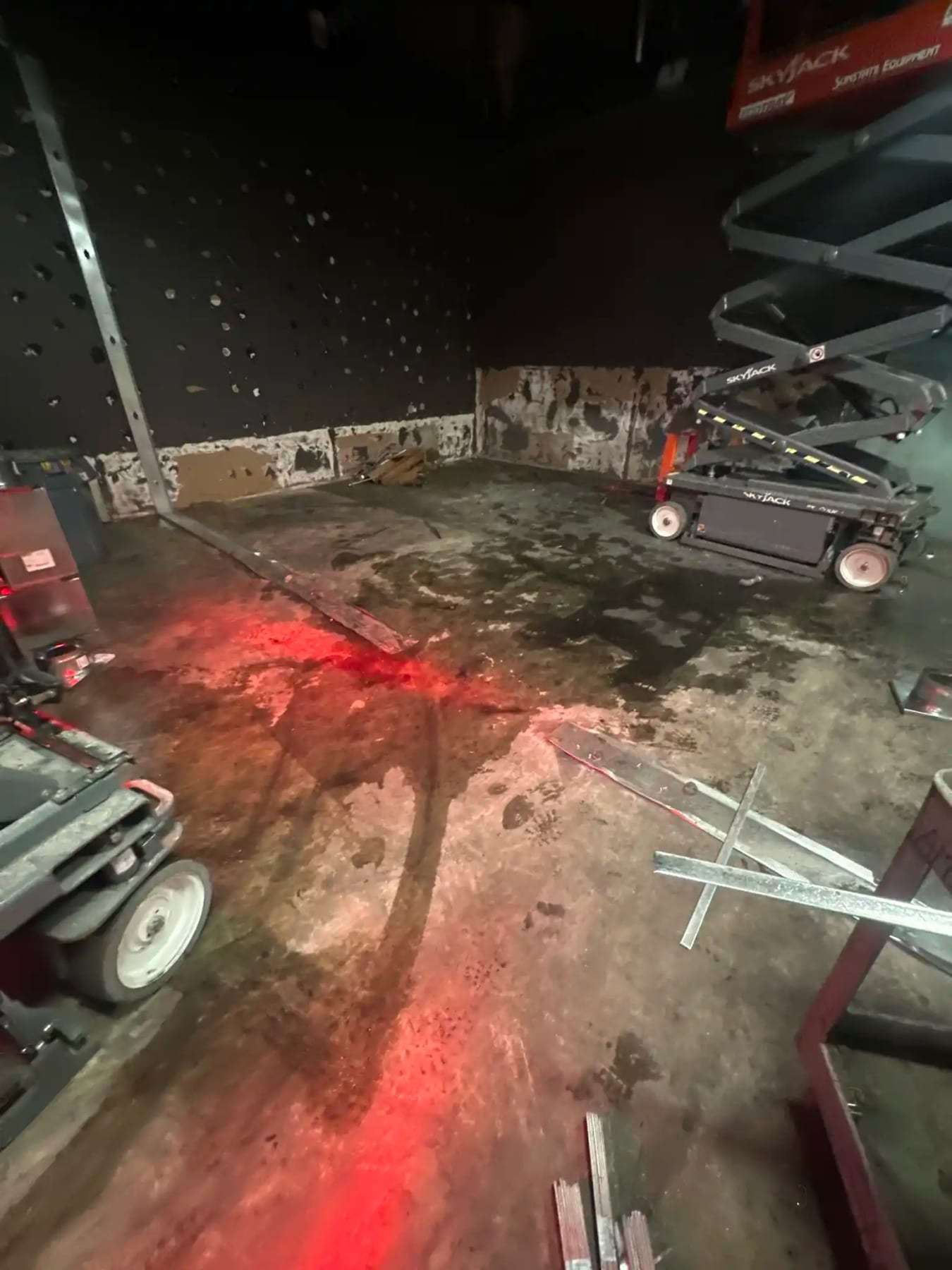 Warehouse floor seen from a lift with equipment below